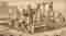 Engraving of a stone foundation being laid, a metaphor for the systematic approach to achieving goals.